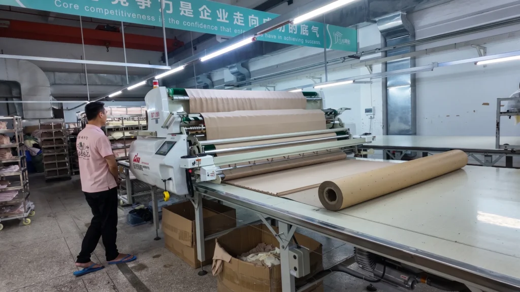 automatic fabric spreading scaled